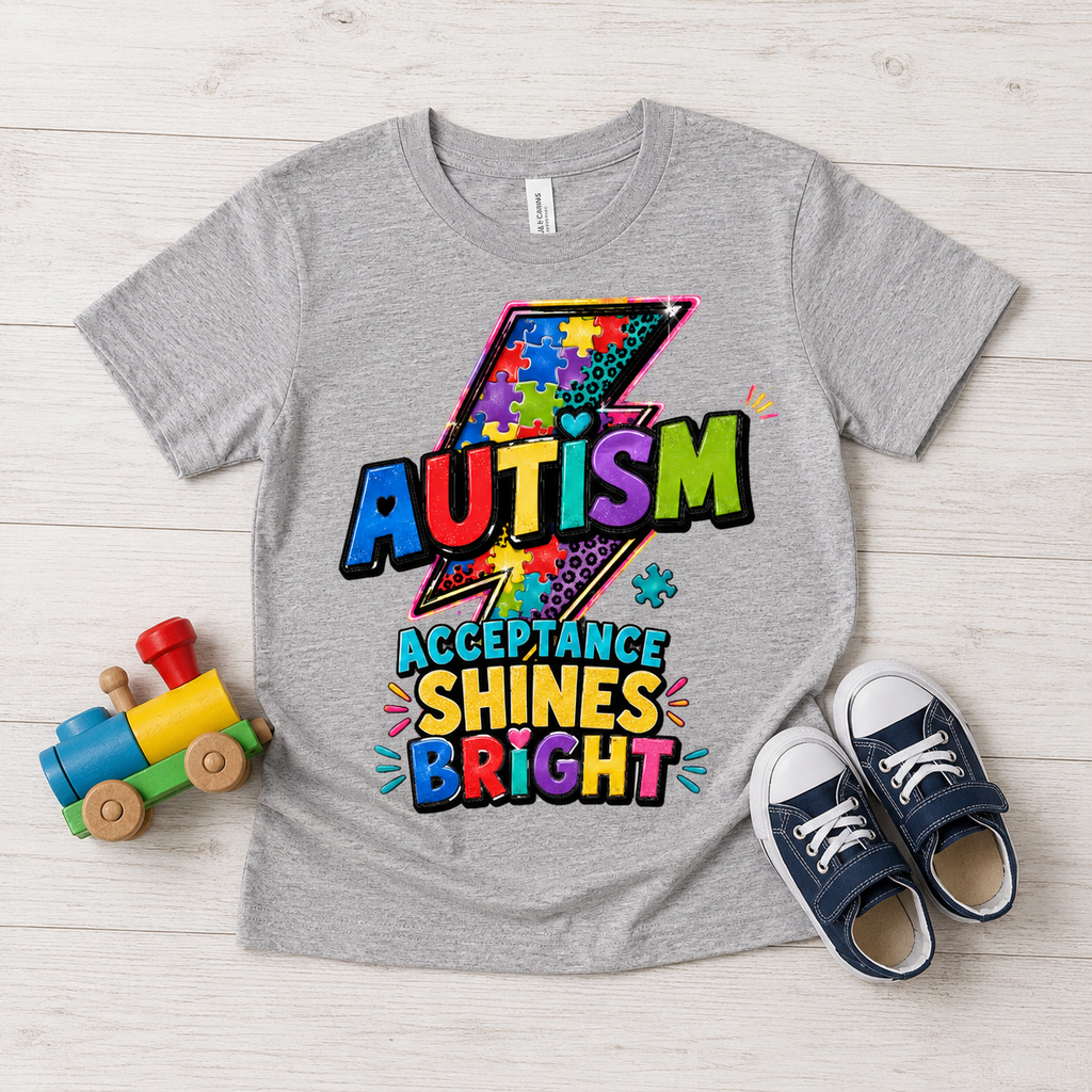 Autism Acceptance Toddler Tee — "Acceptance Shines Bright" Colorful Puzzle Lightning