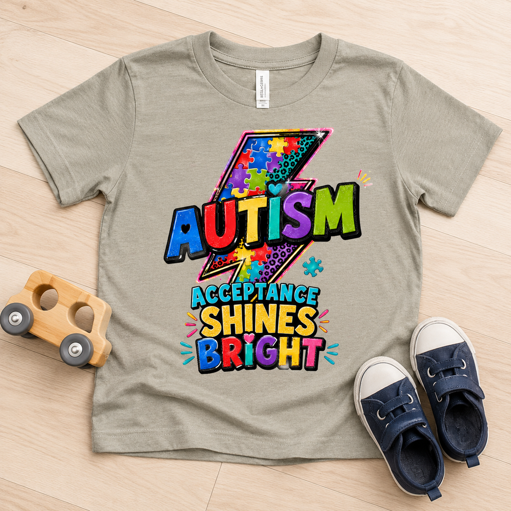 Autism Acceptance Toddler Tee — "Acceptance Shines Bright" Colorful Puzzle Lightning