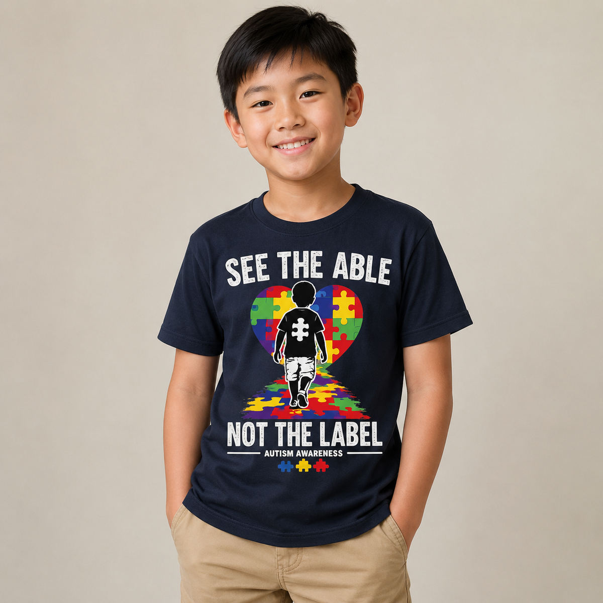 Youth Tee — "See The Able Not The Label" Autism Puzzle Heart Shirt