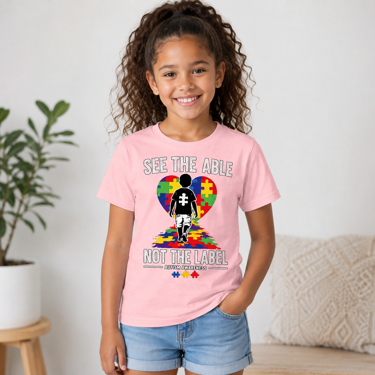 Youth Tee — "See The Able Not The Label" Autism Puzzle Heart Shirt