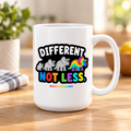 15oz Mug — "Different Not Less" Autism Support Rainbow Triceratops